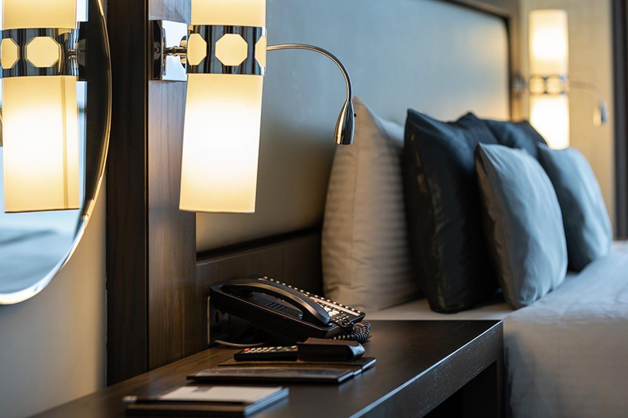 Royal M Al Aqah Beach Resort By Gewan Exterior photo A telephone in a hotel room