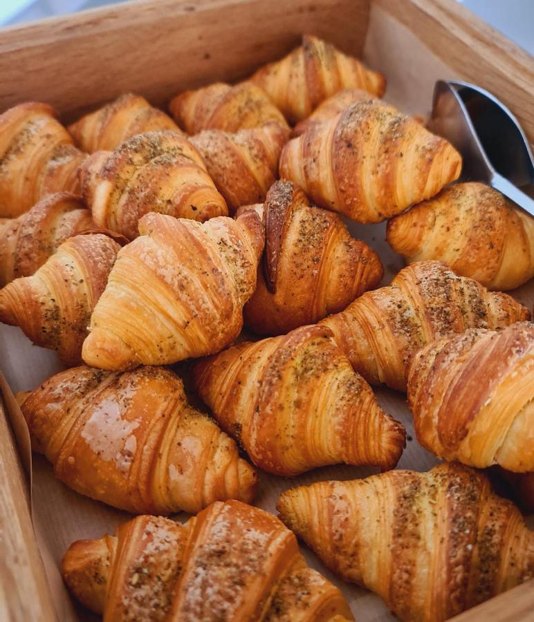 Royal M Al Aqah Beach Resort By Gewan Exterior photo Croissants