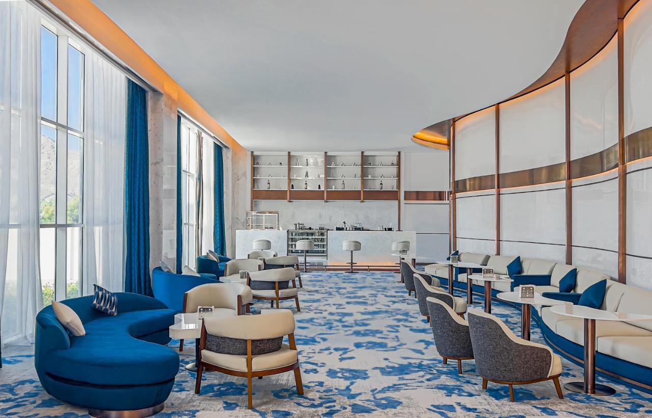 Royal M Al Aqah Beach Resort By Gewan Exterior photo The Lounge at the airport
