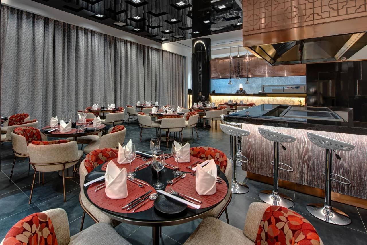 Royal M Al Aqah Beach Resort By Gewan Exterior photo The interior of the restaurant