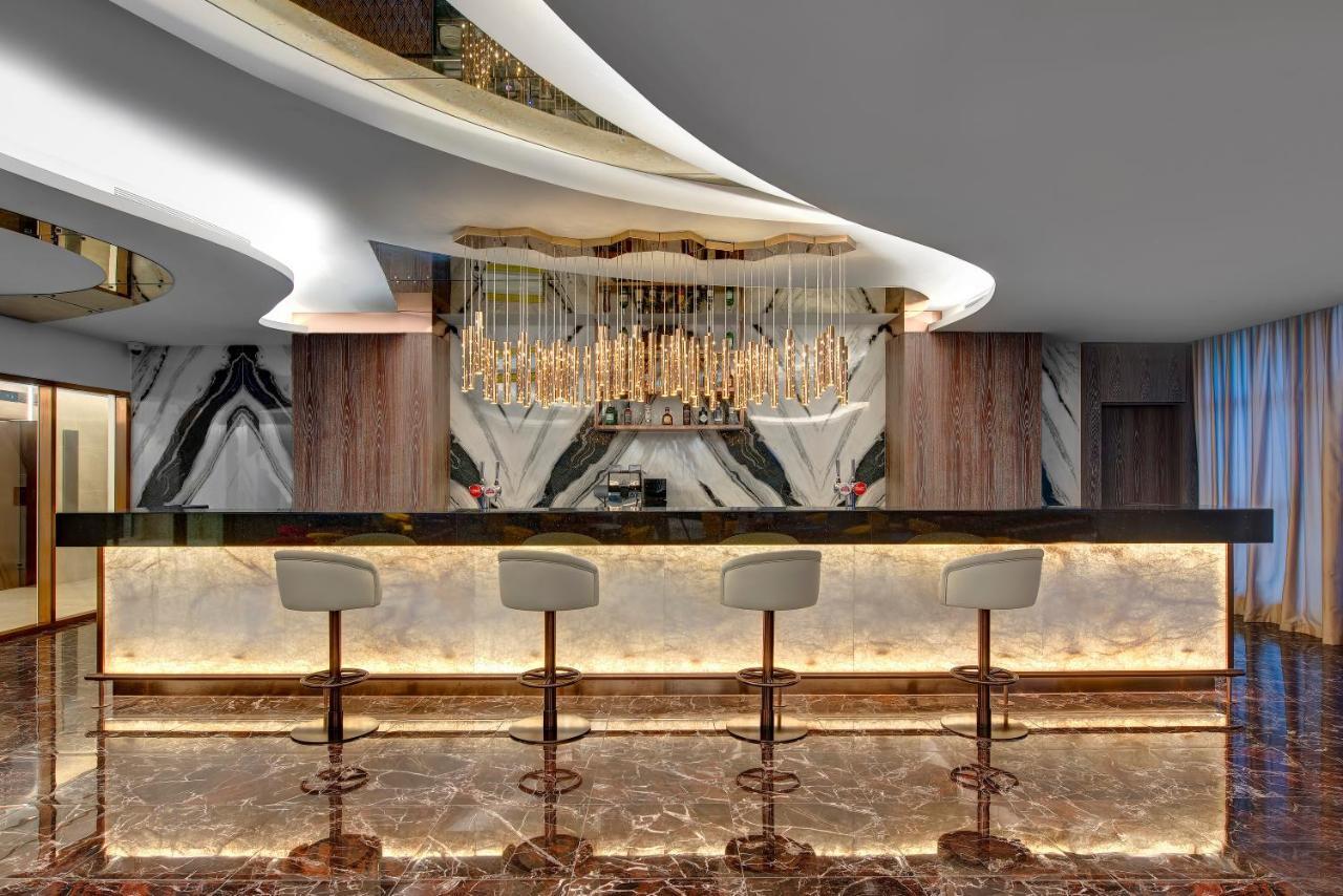 Royal M Al Aqah Beach Resort By Gewan Exterior photo The bar at the 101 lounge